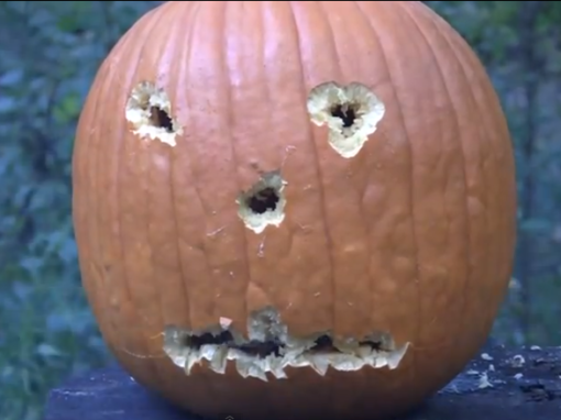 Carving a pumpkin, with a handgun